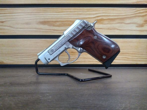 USED IN GOOD CONDITION / Taurus PT-22 22LR Rimfire Pistol with Rosewood Grips and Gold Accents